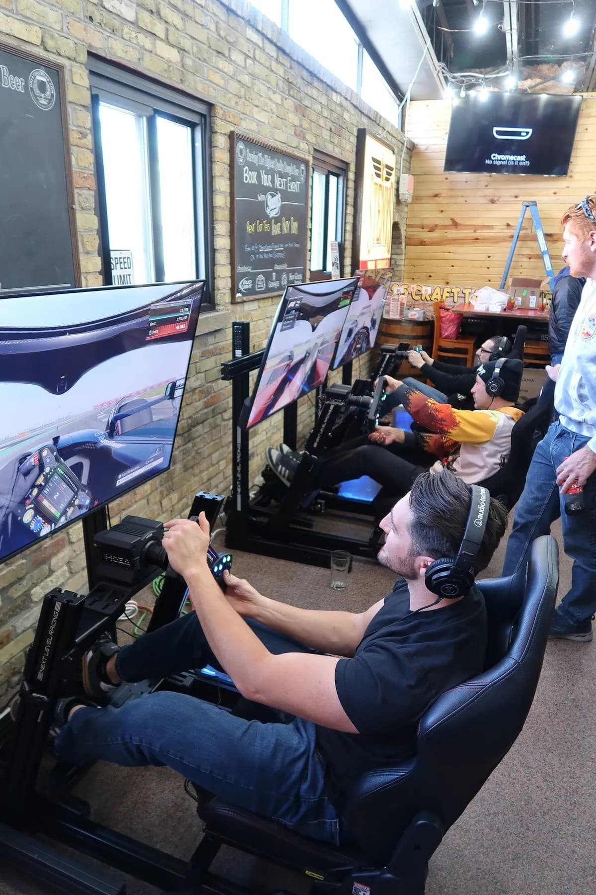 Three Skid Mark simulators set up at an event